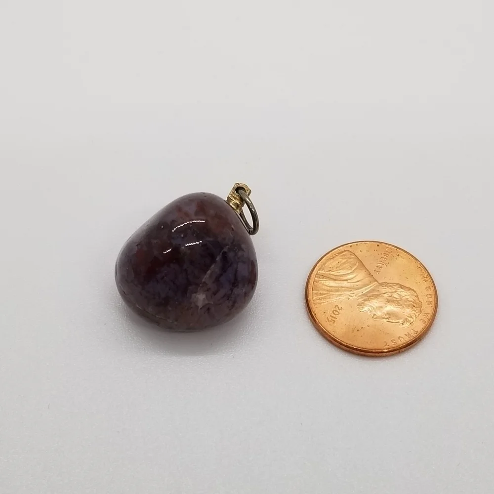 mottled purple stone pendant